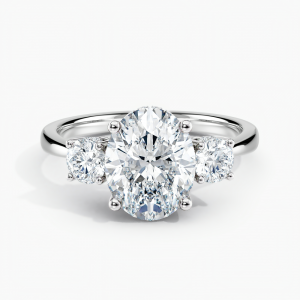 Under Halo Three Stone Lab Grown Diamond Engagement Ring 1.00 ct. Center Oval Lab Grown Diamond in 14K White Gold. he ring can be set with other shapes, carat weights and clarity . Please contact us with any questions.